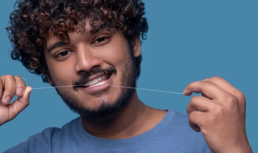 how can you floss with dental implants